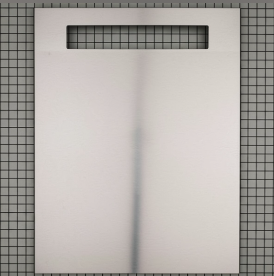 Rectangular shower pan with grid pattern on a tiled wall