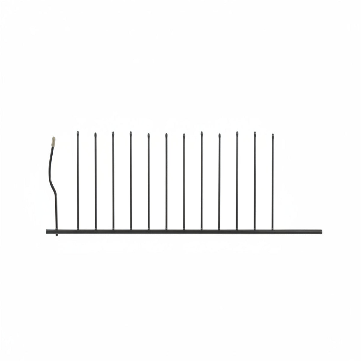Metal rod with small spikes on a grid background