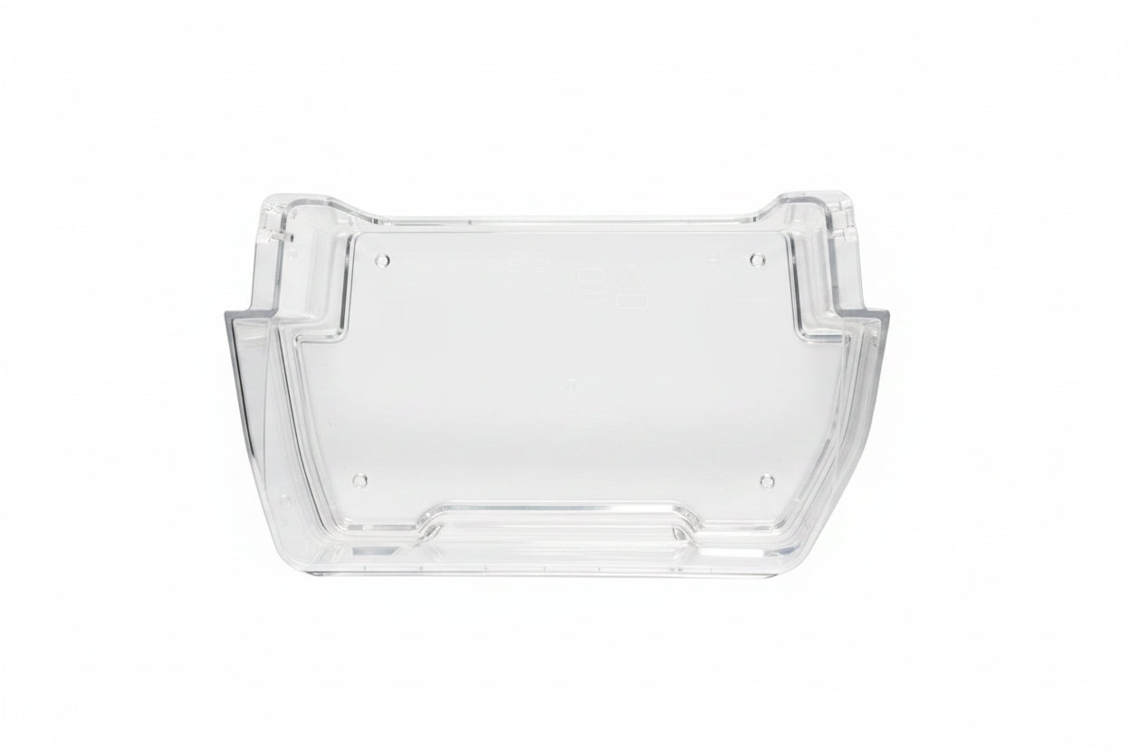 Clear plastic component on a grid background