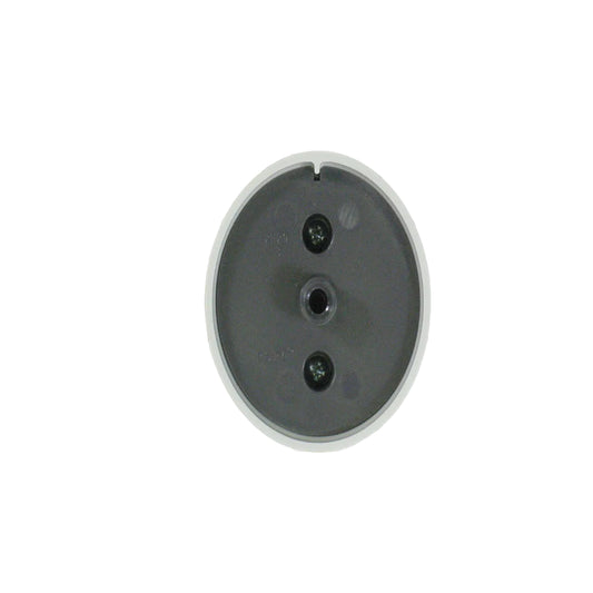 Round metallic component on a grid background