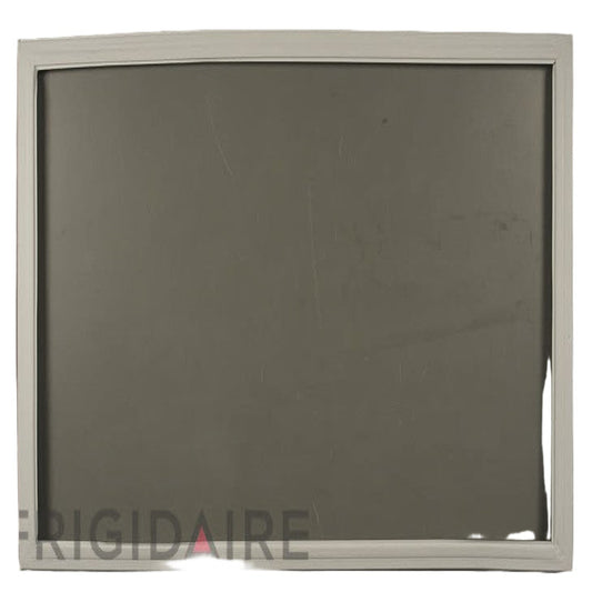 Frigidaire refrigerator door panel with visible wear and tear