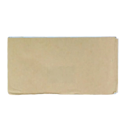 Rectangular beige sanding block on a grid background