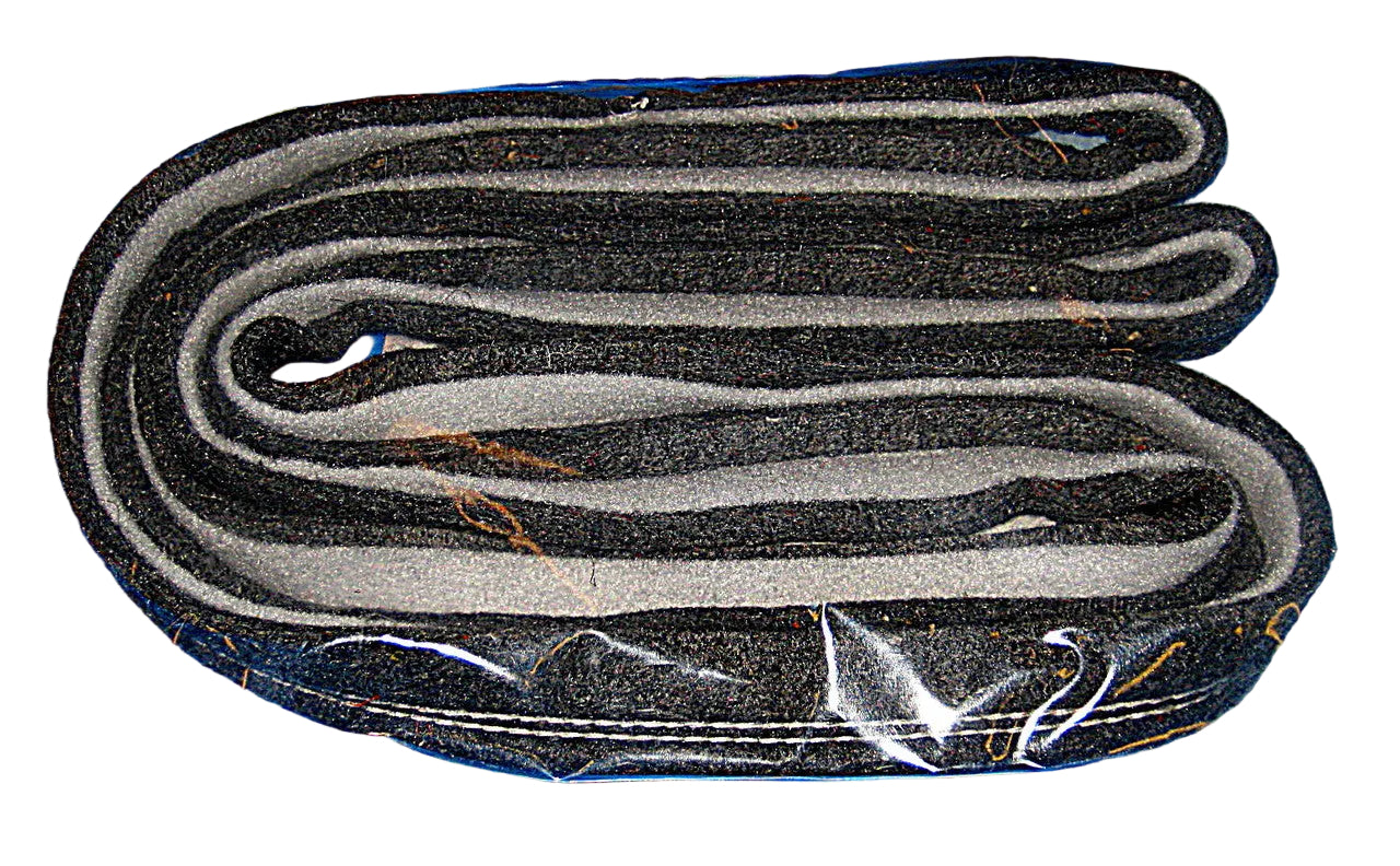 Black and gray belt in clear packaging on a blue background
